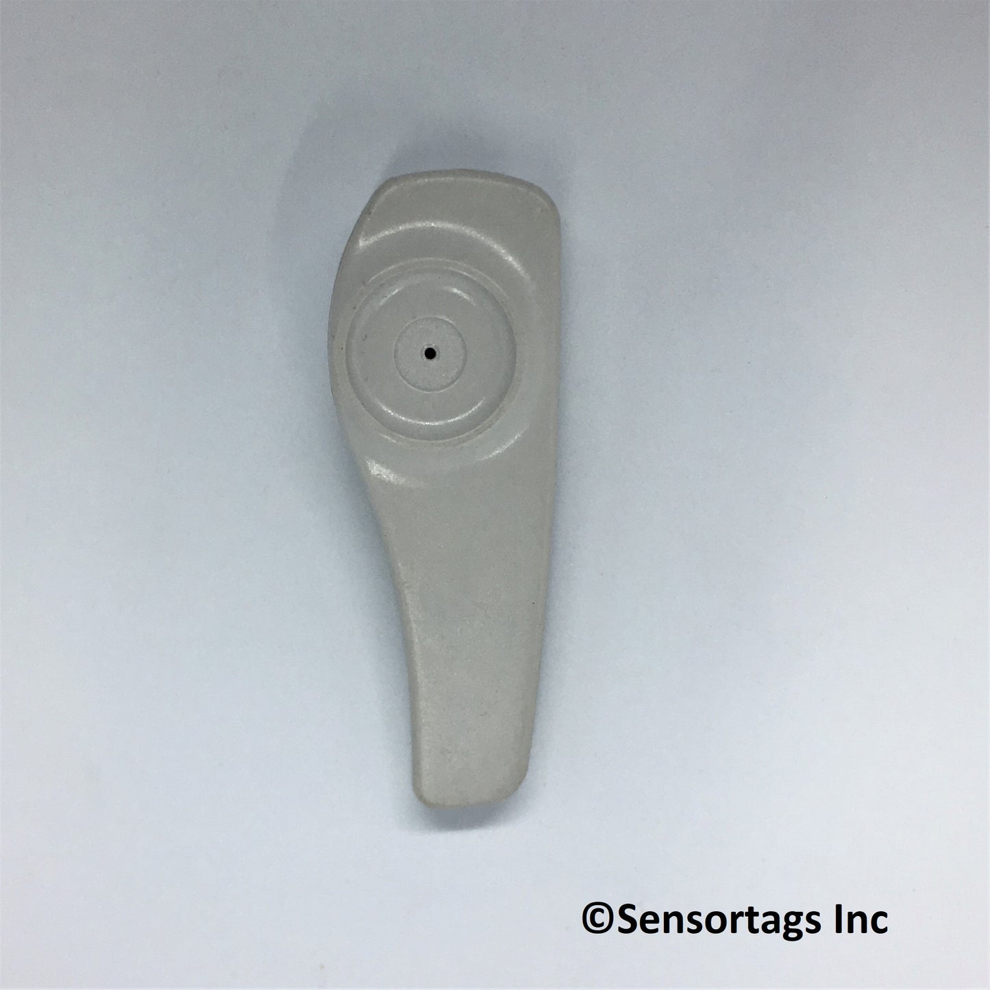 image of sensormatic supertag security device