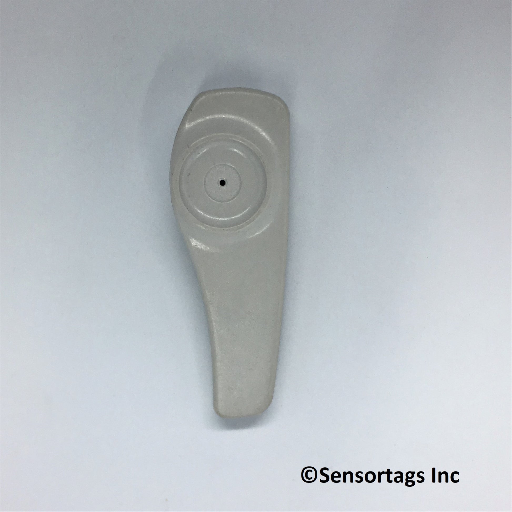 image of sensormatic supertag security device