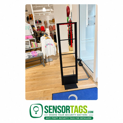 Ebony Mono WiFi Tower 8.2 MHz – black WiFi security tower with red top light, in a store