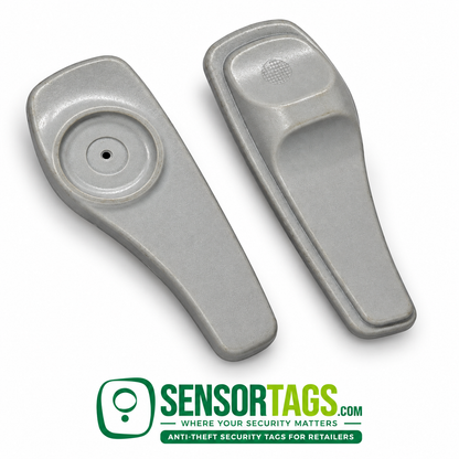 Two gray SuperTag II security tags in a diagonal arrangement, showing front and back surfaces against white.