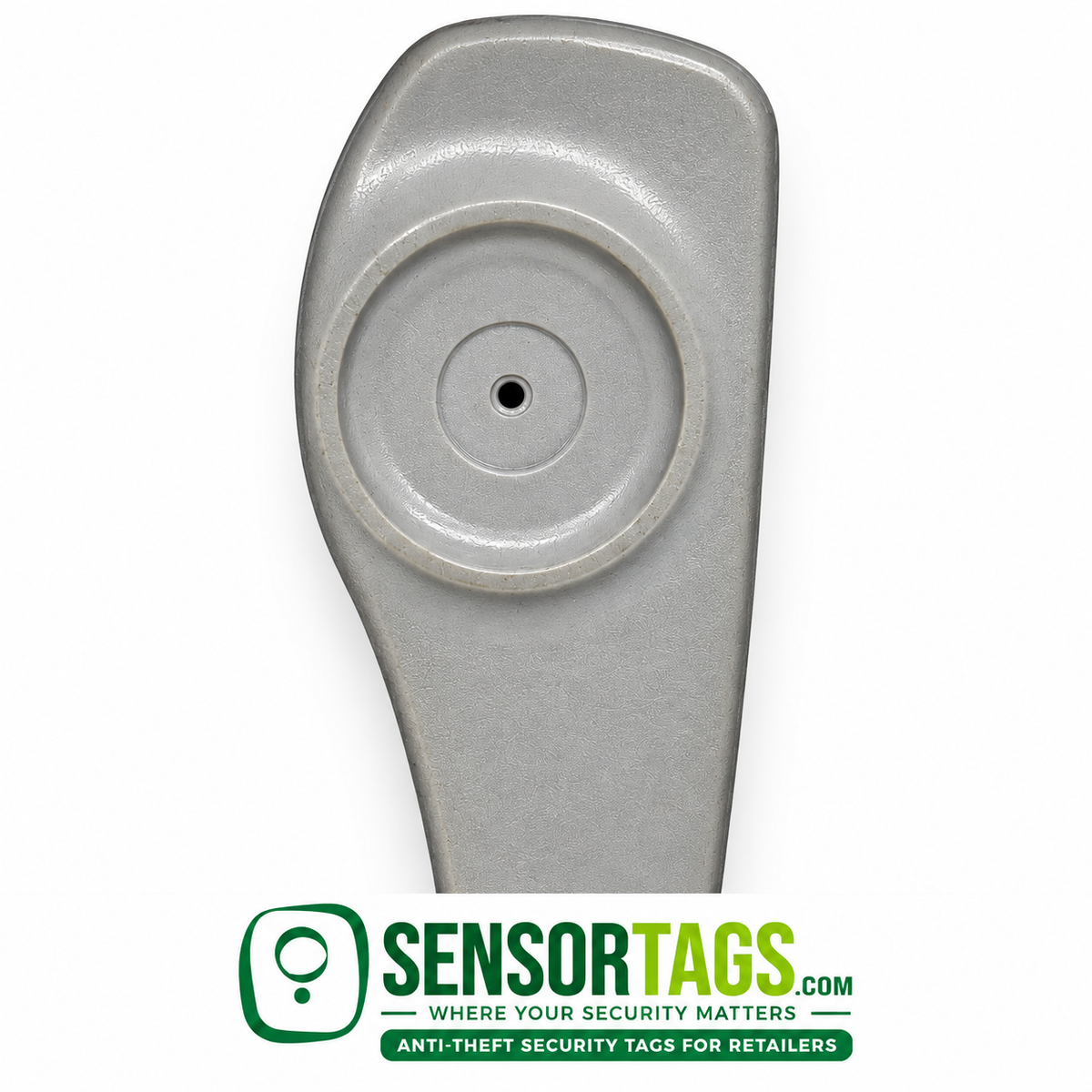 Close view of the circular pin recess on a gray SuperTag II security tag.