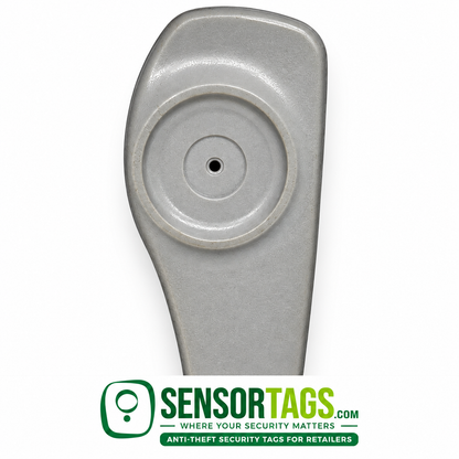 Close view of the circular pin recess on a gray SuperTag II security tag.