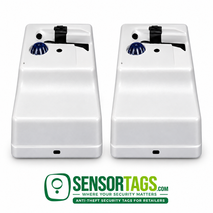 Two refurbished UltraMax electronic tag removers seen from a raised front angle, showing both sloping housings and upper decks.