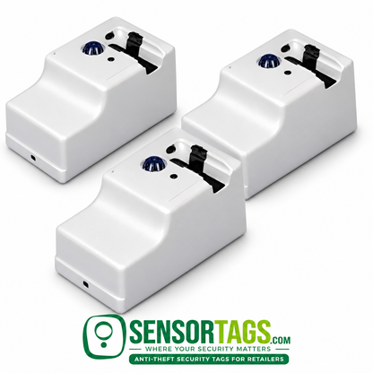 Three refurbished UltraMax electronic tag removers in a studio display, each showing the white housing and black tag cradle.